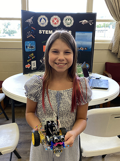 Summer Institute STEMS SEALs Student with Robotic Rover 2