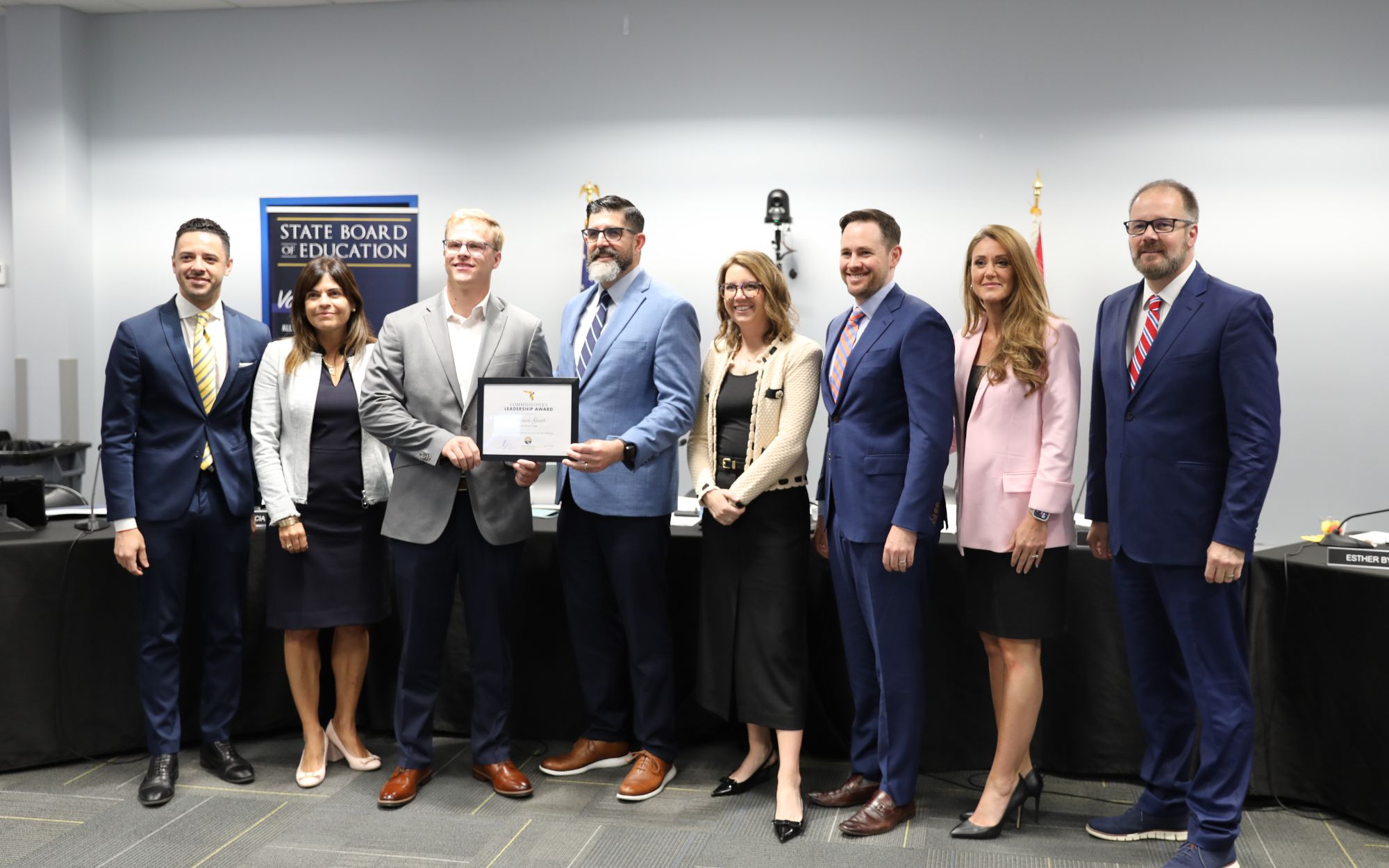 FDOE board members present Chancelor’s Leadership Award to Mason Good
